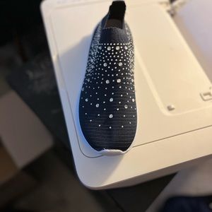 Woman’s sparkling slip on